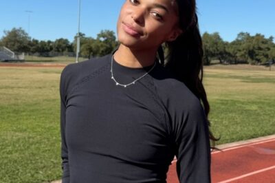 PHOTOS: Olympic Gold Medalist Gabby Thomas Causes A Major Stir In Her Barely-There Black Swimsuit