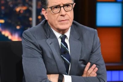 SH0CKINGNEWS “They Tried to Silence Me—But America Just Gave Me the Loudest Ovation Yet!” Stephen Colbert Breaks Emmy Silence, Teases Secret New Show After ‘Late Show’ Shock Cancellation  In a jaw-dropping twist that left Hollywood gasping, Stephen Colbert turned the 2025 Emmy Awards into his own personal stage—delivering a raw, emotional monologue that had A-listers on their feet and the internet ablaze. “While I have your attention, is anyone hiring?” Colbert quipped, flashing an old headshot and teasing, “I’ve got 200 very qualified candidates with me here tonight, who will be available in June.” Just months after CBS abruptly axed his iconic Late Show, Colbert stunned viewers by accepting an Emmy with tears in his eyes, thanking fans for “the privilege to be part of the ‘Late Night’ tradition” and dropping hints about “cherished plans” and a mysterious new project that could change late-night TV forever. “If the elevator tries to bring you down, go crazy and punch a higher floor!” he urged, as social media exploded. What really happened behind the scenes? And what’s next for America’s most outspoken host? The truth is finally coming out—and you won’t believe what Colbert revealed…