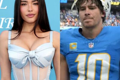 Justin Herbert Is Getting Roasted After New Photo Shows The Cringeworthy Thing He Did While Kissing Madison Beer On The Sideline