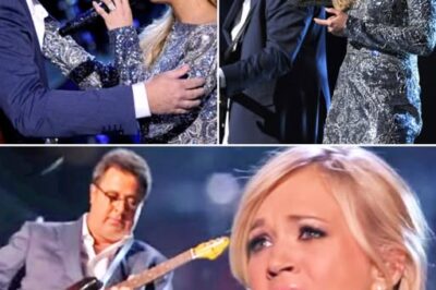Vince Gill and Carrie Underwood should honestly come with a warning label—because when they sing together, it’s addictive, and people can’t stop hitting replay. Their performance of “How Great Thou Art” was so powerful it felt like time stopped.  Carrie’s voice floated out like something straight from heaven—soft one second, explosive the next—while Vince’s guitar and harmonies wrapped around her vocals like pure magic. They’ve shared the stage before, but this moment was on a whole different level.  By the time Carrie unleashed that final, earth-shaking power note, the entire crowd was on its feet, jaws dropped, and hearts racing. Viewers weren’t just impressed—they were spellbound. No wonder the video blew up on YouTube.  With chemistry like that, it’s almost unfair… because once you hear them together, you just can’t stop…