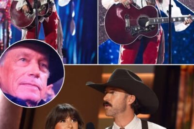 Riley Green’s voice nearly cracked the moment Ella Langley walked onto the CMA stage. “ELLAAA… you just broke my heart!” he blurted out, and honestly, everyone watching knew exactly what he meant.  From the very first shaky note of “Choosin’ Texas,” the entire arena went silent—as if someone had hit pause on the world. Ella didn’t just sing. She took over the room. Her energy felt raw, real, and lived-in, like every mile of Texas dust was wrapped into her voice.  Halfway through the song, she leaned into the mic and whispered, “This is my Texas. My heart. My everything.” And it hit people so hard it felt like a hand pressing right against their chest. Social media erupted instantly—fans were crying, shouting, typing in all caps, calling it one of the most emotional country moments of the entire year.  Then the cameras cut to George Strait. He was standing, clapping slowly, eyes shining. Under his breath, he murmured, “That’s how you keep country alive.” Riley Green just nodded, stunned, like he knew he’d just witnessed something huge.  This wasn’t just a performance. It was a wildfire of emotion, spirit, and Texas soul—one of those once-in-a-lifetime moments no one lucky enough to see it will ever forget… WATCH BELOW 👇👇👇