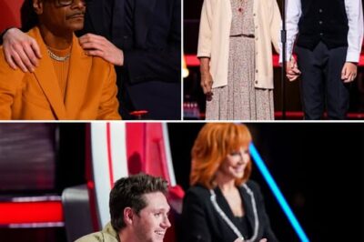 At The Voice 2025, the crowd went silent as a 15-year-old boy walked onto the stage holding his grandmother’s hand—her silver hair glowing under the lights, her steps slow but steady.