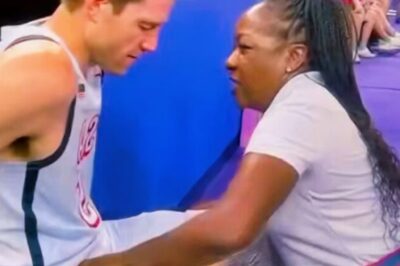Team USA Trainer Goes Viral After Cameras Catch Her In Curious Position While Dealing With Injured Player On The Bench [VIDEO]