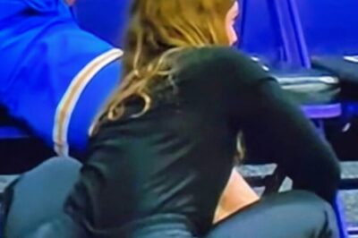 UCLA Trainer Who Went Viral for Her Provocative Courtside Pose Has Been Identified & Locks Down Social Media [PHOTOS]